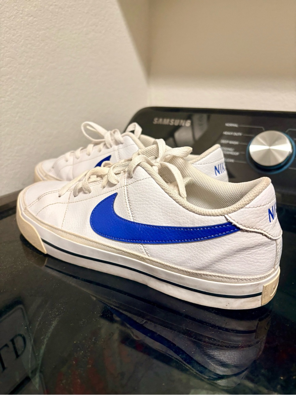 Nike White Sneakers with Blue Swoosh - Men's